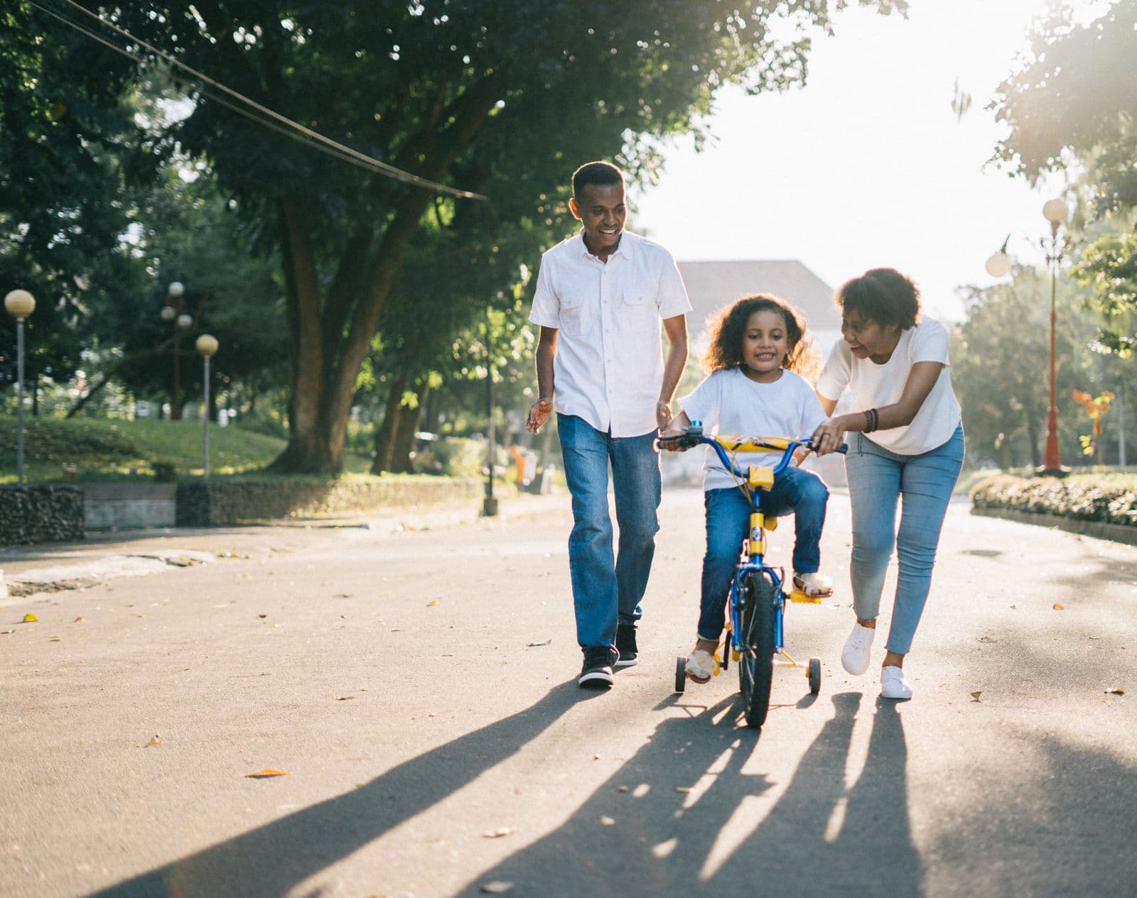 Grandparents smiling with their grandchild